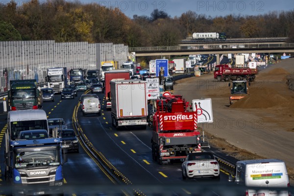 Motorway construction site, the A57 is extended to 6 lanes on the section between the Meerbusch interchange and the Oppum junction, traffic runs parallel to 2 narrowed lanes, Krefeld, North Rhine-Westphalia, Germany