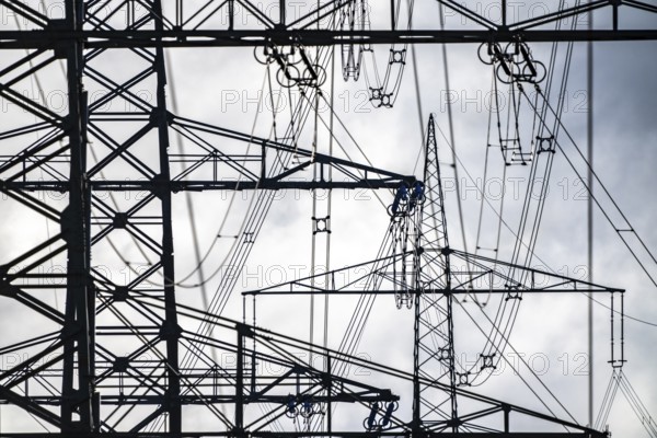 380-kV high-voltage overhead line, new building, along the A57 motorway, near Meerbusch, high-voltage masts, North Rhine-Westphalia, Germany
