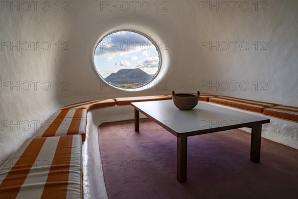 Sitting area with a view of the Volcán de la Corona volcano, interior at the Mirador del Río viewpoint, designed by artist César Manrique, Lanzarote, Canary Islands, Spain