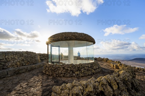 Staircase and viewing platform at the Mirador del Río viewpoint, in the evening light with sun stars, designed by artist César Manrique, Lanzarote, Canary Islands, Spain