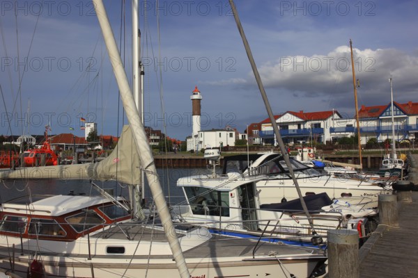 Timmendorf lighthouse on the island of Poel on the Baltic Sea, harbour in the foreground, Nordwestmecklenburg district, Mecklenburg-Western Pomerania, Germany