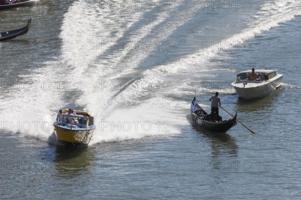 Ambulance boat in action on the Grand Canal, Rialto, Venice, Veneto, Italy