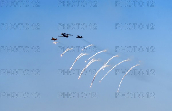 The Indian Air Force aerobatic team performs during an air show as part of the 93rd Air Force Day celebrations on November 8, 2025 in Guwahati, India