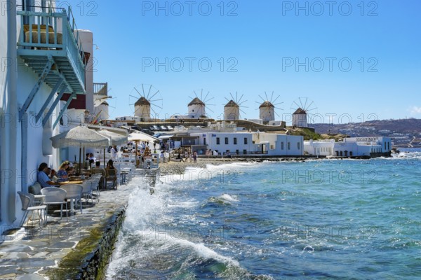 Mykonos, Cyclades, Greece - The six sixteenth-century windmills, lined up on a hill above Mykonos Town, Mykonos Chora, are the island's landmark. Mykonos is part of the Cyclades archipelago in the Aegean Sea