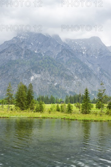 Landscape of Lake Almsee on a rainy day in spring, Salzkammergut, Austria