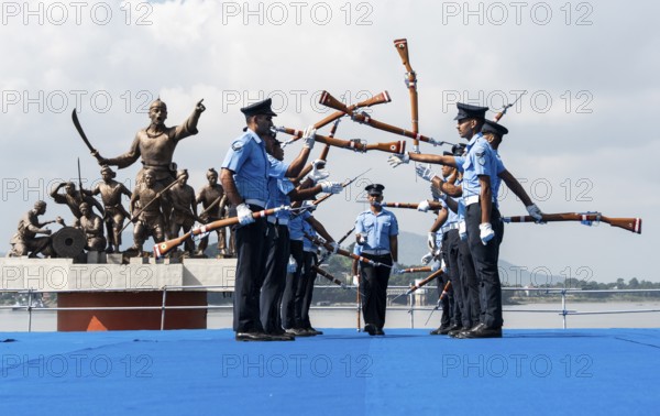 Indian Air Force personnel performs a bayonet drill demonstration on the bank of Brahmaputra river, during rehearsals ahead of the air show organised as part of the 93rd Air Force Day celebrations, on November 5, 2025 in Guwahati, India
