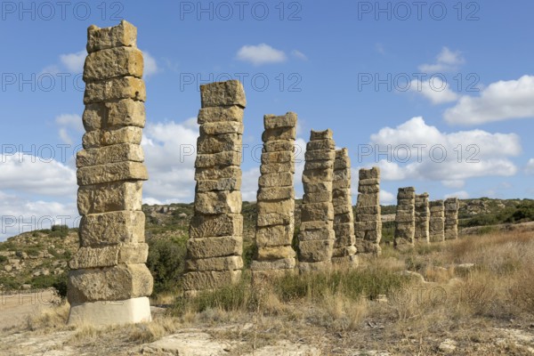 Stone columns of ancient aqueduct, Roman site of Los Banales, near Layana, Zaragoza province, Aragon, Spain