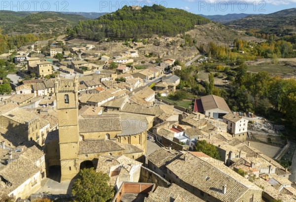 Church tower and rooftops of medieval village of Uncastillo, Cinco Villas, Zaragoza province, Aragon, Spain