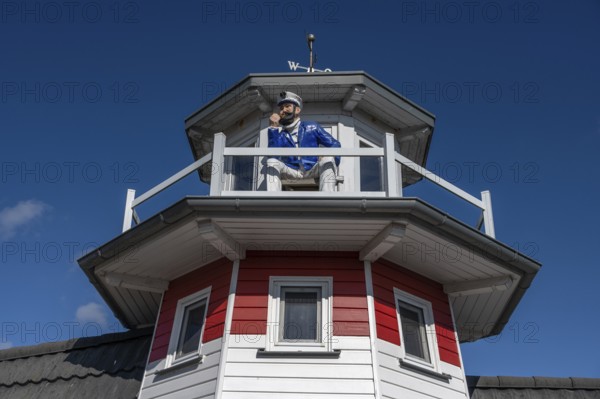 Captain figure on the balcony of a holiday home, Zingst, Darß, Mecklenburg-Western Pomerania, Germany