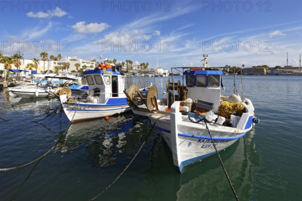 Fishing boat, fishing boats, picturesque, Neratzia fortress in the back, Mandraki harbor, seaport, old town, Kos town, Kos island, Dodecanese islands, Greece, eastern Adriatic Sea, Mediterranean