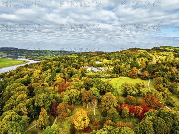 Autumn colours over Bodnant House and Garden from a drone, Conwy River, Colwyn Bay, Conwy, Wales, England, United Kingdom