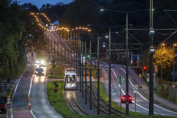 Bogestra tram, line 305, on the Wattenscheider Hellweg, tram line in the middle of the street, street lighting, North Rhine-Westphalia, Germany