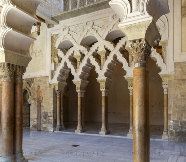 Ornate Islamic design of decorated Moorish arches, Aljafería Palace, Zaragoza, Aragon, Spain