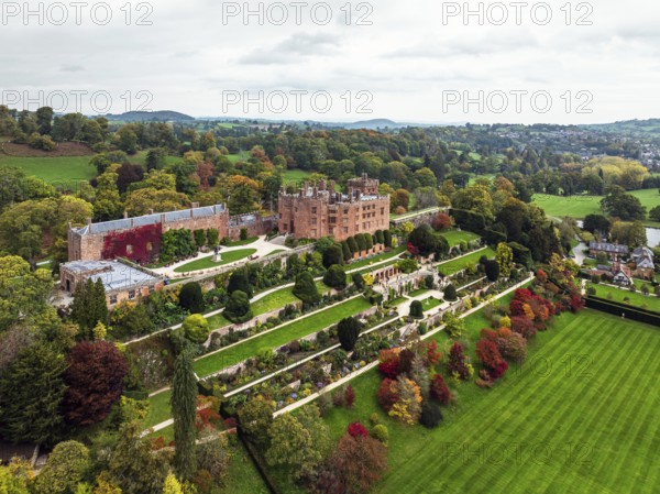 Autumn colours over Powis Castle and Garden from drone, Welshpool, Powys, Wales, England, United Kingdom