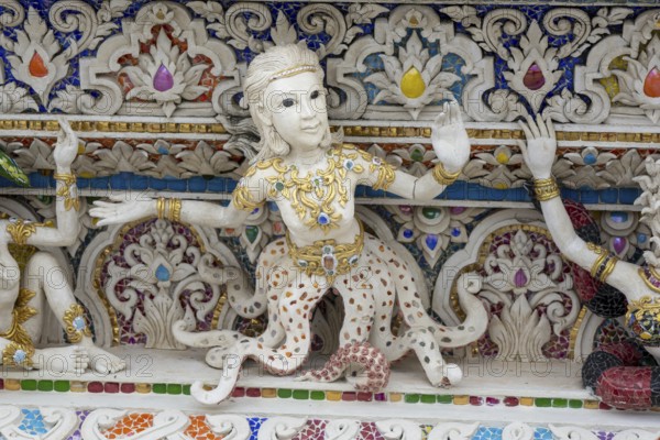 Decorative elements with pop culture references (for example comics, superheroes) in the stucco and porcelain vases outside and inside the art hall with modern art trends such as minimalism and abstraction, Wat Pariwat, Yan Nawa district, Bangkok, Thailand