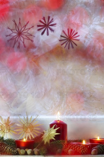 Christmassy decorated iced window, candle light, straw stars, Germany