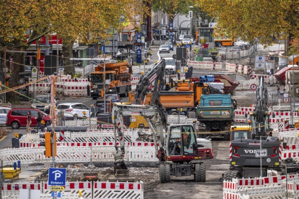Large-scale construction site on Alleestrasse in downtown Bochum, road construction, construction of new cycle lanes, sidewalks, road surfaces, renewal of canals and water collection systems, trenches, for rainwater, greening, sustainable and modern road conversion, North Rhine-Westphalia, Germany