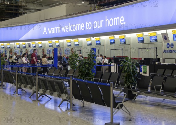 British Airways check in bag drop area, Terminal 5 London Heathrow airport, London, England, UK