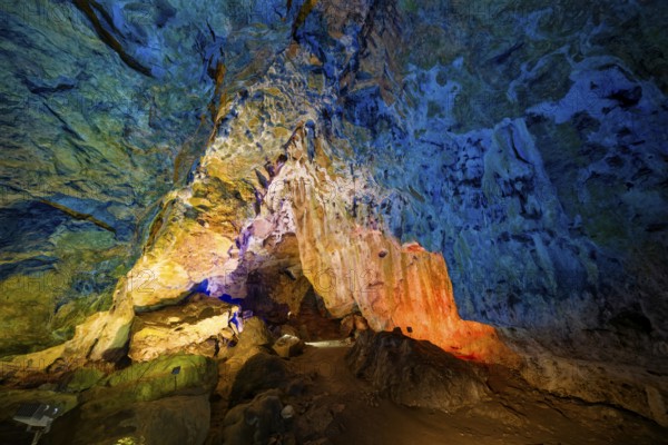 Coloured lighting, fog cave, stalactite cave in the Swabian Jura, stalactites, stalactite forest, interior view, Lichtenstein, Baden-Württemberg, Germany
