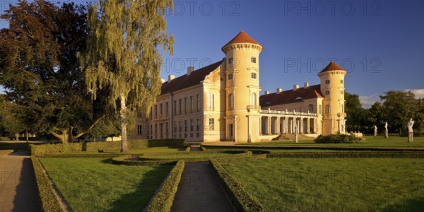 Rheinsberg Castle, front in late evening light, prime example of Friederician Rococo, Ruppiner Land, Brandenburg, Germany