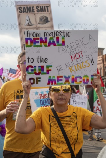 Detroit, Michigan USA - 18 October 2025 - A large crowd gathered for a 'No Kings' rally, protesting President Trump's actions against immigrants and against democratic institutions