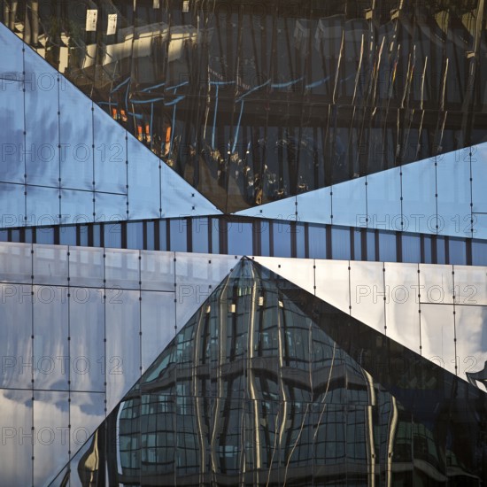 Cube Berlin, cube-shaped office building with folded glass façade reflecting the surroundings, detail, Washingtonplatz, Berlin, Germany