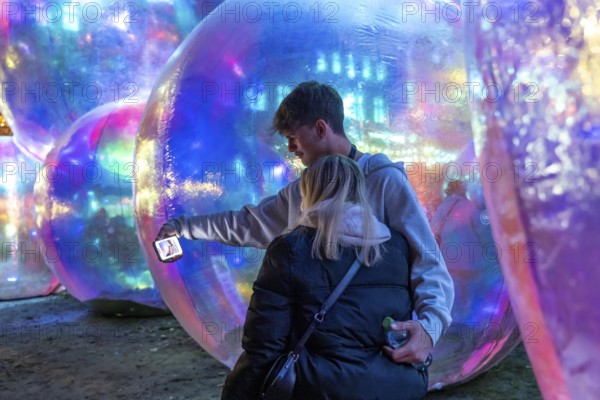 The 10th Essen Light Festival, in the city centre, second largest light art festival in Germany, light art on the Burgplatz, Evanescent light installation, by the Australian artist duo Atelier Sisu, large bubble-like spheres, with light and sound, Essen, North Rhine-Westphalia, Germany