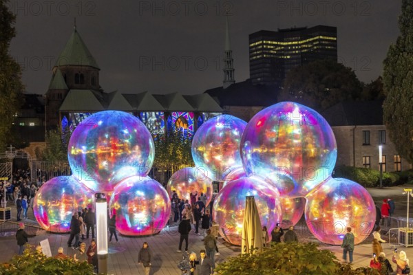 The 10th Essen Light Festival, in the city centre, second largest light art festival in Germany, light art on the Burgplatz, Evanescent light installation, by the Australian artist duo Atelier Sisu, large bubble-like spheres, with light and sound, town hall, cathedral, Essen, North Rhine-Westphalia, Germany