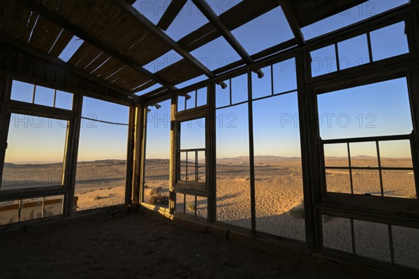 View from a former dwelling house into the desert, Kolmanskop, restricted diamond area, Karas region, Namibia