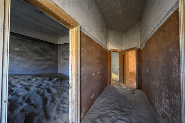 Sand mountains in a former dwelling house, interior photograph, Kolmanskop, restricted diamond area, near Lüderitz, Karas region, Namibia