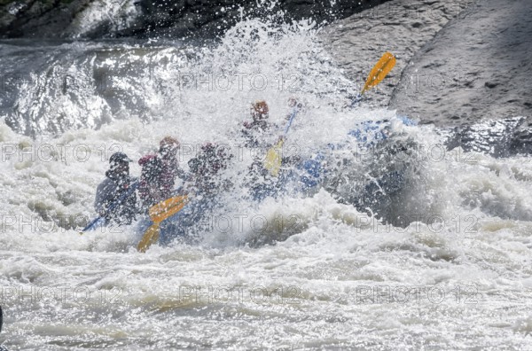 A group of people white water rafting, Costa Rica, Central America