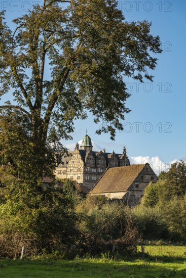 View of Hämelschenburg Castle, a moated castle and major work of the Weser Renaissance, near Emmerthal, Weserbergland, Lower Saxony, Germany