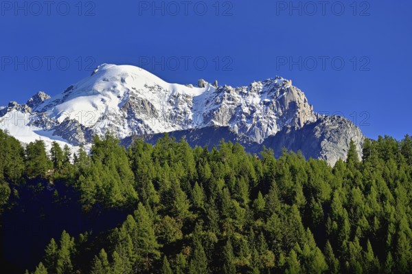 Aiguille des Grands Montets and snow-covered Aiguille Verte, Chamonix-Mont-Blanc, Haute-Savoie, France