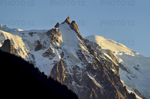 From left snow-covered Aiguille du Midi, Mont-Blanc, Vallot Hut, Chamonix-Mont-Blanc, Haute-Savoie, France