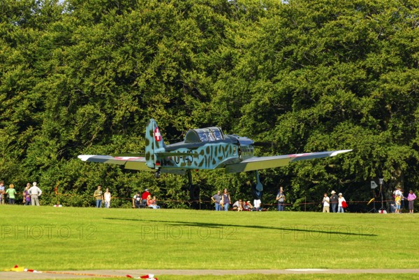 A Pilatus P-2 of Pilatus Flugzeugwerke AG with the registration D-EPII during a flight demonstration as part of an air show at the Rossfeld in Metzingen-Glems, Baden-Württemberg, Germany, for editorial use only
