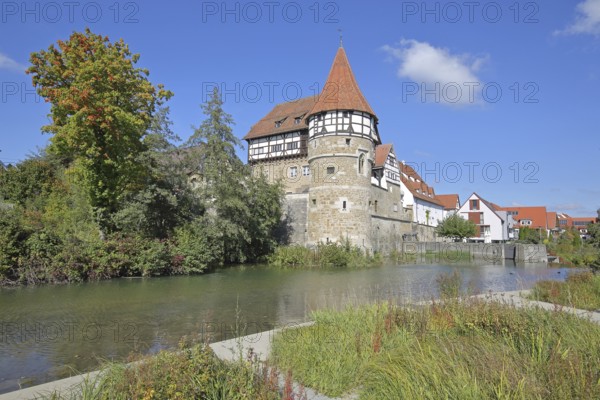 Zollern Castle built around 1255 with water tower on the Eybach stream, half-timbered house, autumn, castle, Balingen, Swabian Alb, Baden-Württemberg, Germany