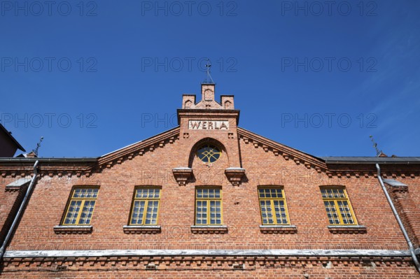 Brick façade with inscription Werla, former paper factory and mill for the production of groundwood pulp board, UNESCO World Heritage Site Factory Village Verla, Maailmanperintökohde Verlan puuhiomo ja pahvitehdas, Verla Rapids, Kymenlaakso, near Kouvola, Finland