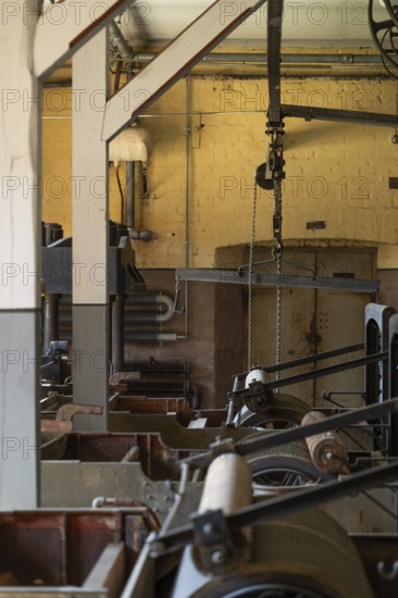 Factory hall with historical machines for the production of cardboard and paper, former paper factory and mill for the production of groundwood pulp board, UNESCO World Heritage Site Verla Factory Village, Maailmanperintökohde Verlan puuhiomo ja pahvitehdas, Verla Rapids, Kymenlaakso, near Kouvola, Finland