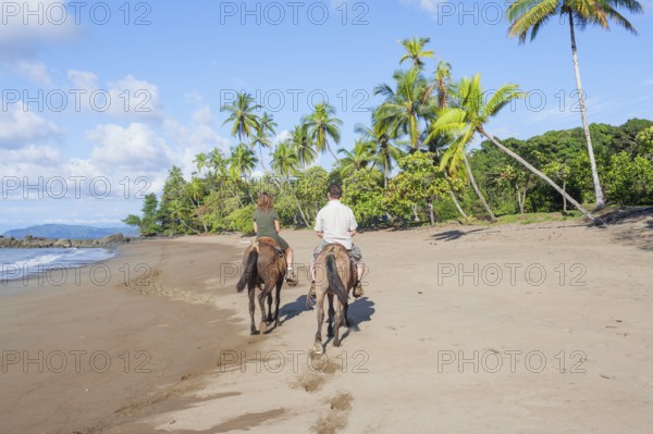 Horseback riding on beach, Drake Bay, Corcovado National Park, Osa Peninsula, Costa Rica
