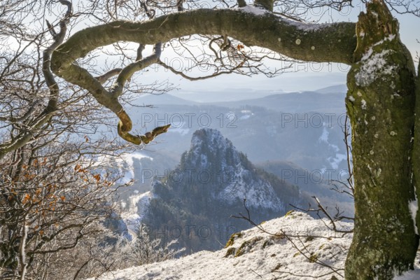 View over the hills and valleys from the mountain with hoarfrost on the branches in winter, Vápec, Horná Poruba, Slovakia