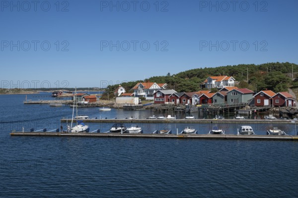 Harbour with boats and boathouses, Resö Island, Bohuslän, Skagerrak, Sotenäs, Västra Götalands län, Sweden