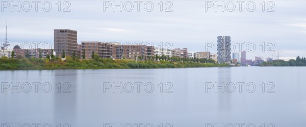 View over the Weser to the Überseestadt, long exposure, Bremen, Germany