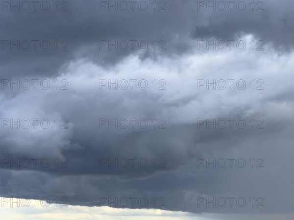 Gathering low pressure area with rain front dark stratus clouds Nimbostratus clouds, international