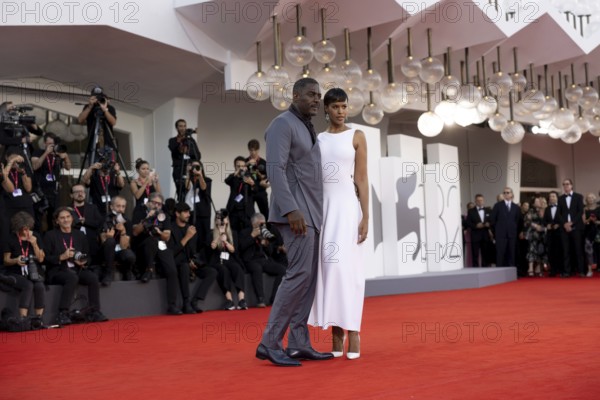 Venice, Italy - 2 September 2025: Idris Elba and Sabrina Dhowre Elba during the red carpet of - A house of Dynamite - during the 82nd Venice International Film Festival
