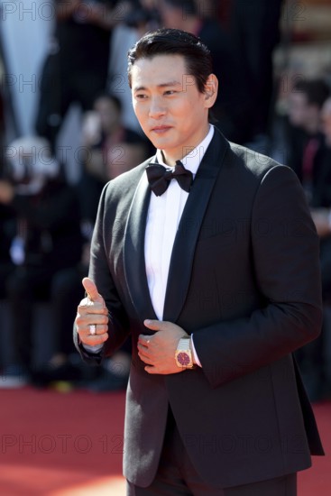 Venice, Italy - 3 September 2025: Teo Yoo during the red carpet of - The Voice Of Hind Rajab - during the 82nd Venice International Film Festival
