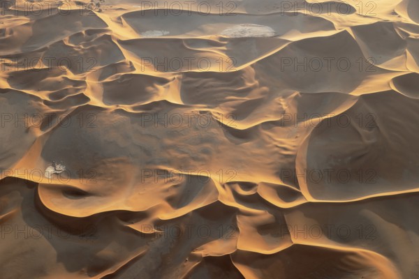 Sand dunes in the Namib Desert. In the evening. Aerial view. Namib-Naukluft Park, Namibia