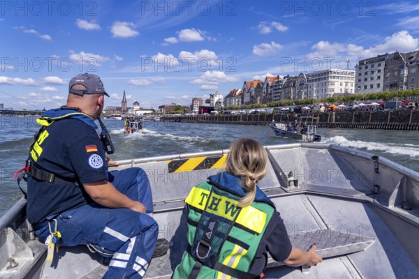 THW multi-purpose boats during a training trip on the Rhine, near Düsseldorf, of the Water Hazards Section, this type of boat is used to transport people and goods as a rescue boat and as a working platform, during the major exercise FÜLEX25, lasting several days, of the THW, Technical Relief Organisation, North Rhine-Westphalia Regional Association, over 3500 volunteers from the 127 North Rhine-Westphalia local associations practise many different deployment scenarios over 4 weekends