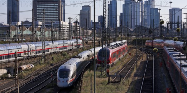 Elevated city view with many trains, railway station and skyscrapers, Frankfurt am Main, Hesse, Germany