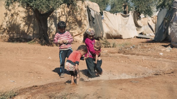 Syrian children playing in a refugee camp near the Turkish border on World Children's Day. Aleppo, Syria October 29, 2022, Aleppo, Syria