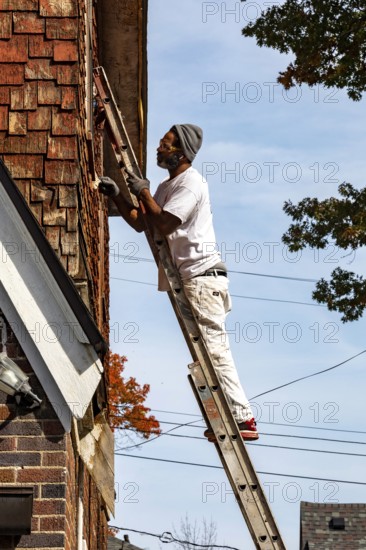 Detroit, Michigan - Workers remodel a house in the Morningside neighborhood that had been vacant for many years. Detroit lost nearly two-thirds of its residents from 1950 to 2020 but has been growing modestly in recent years